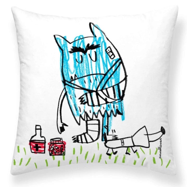 Pillow with a cartoon cat design on a white background