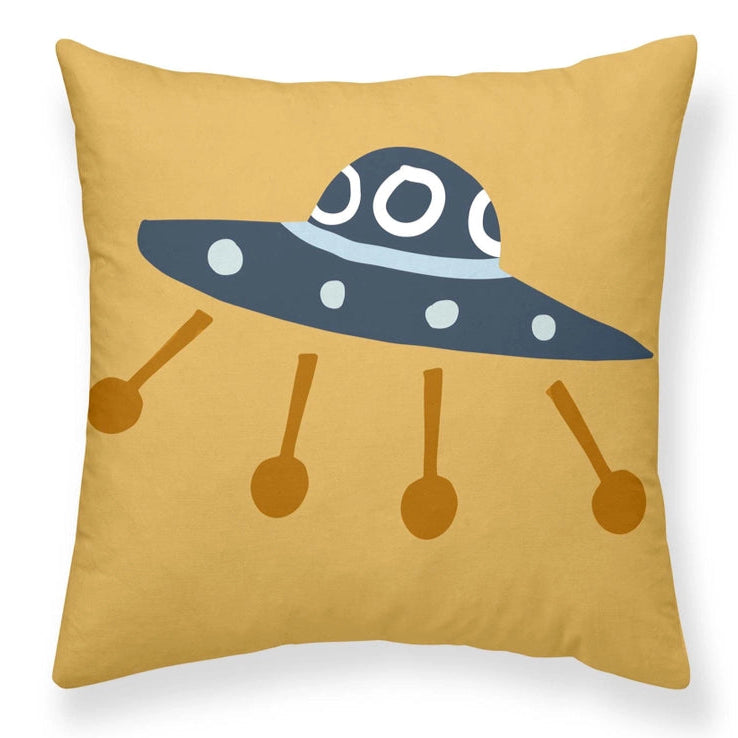 Pillow with a UFO design on a mustard yellow background